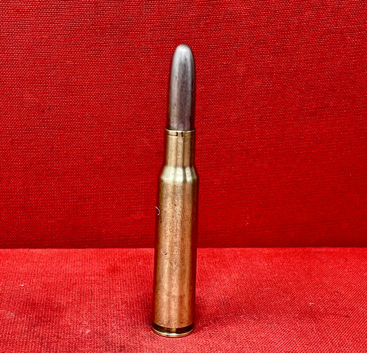 The .300 Weatherby Magnum R-P INERT round is a fine example of premium ammunition design, offering a glimpse into the craftsmanship and engineering behind high-powered rifle cartridges. Originally developed in 1944 by Roy Weatherby, the .300 Weatherby Magnum is renowned for its exceptional performance, designed to achieve higher velocities, flatter trajectories, and greater energy than many standard cartridges.

This specific INERT round is manufactured by R-P (Remington-Peters), one of the most respected n