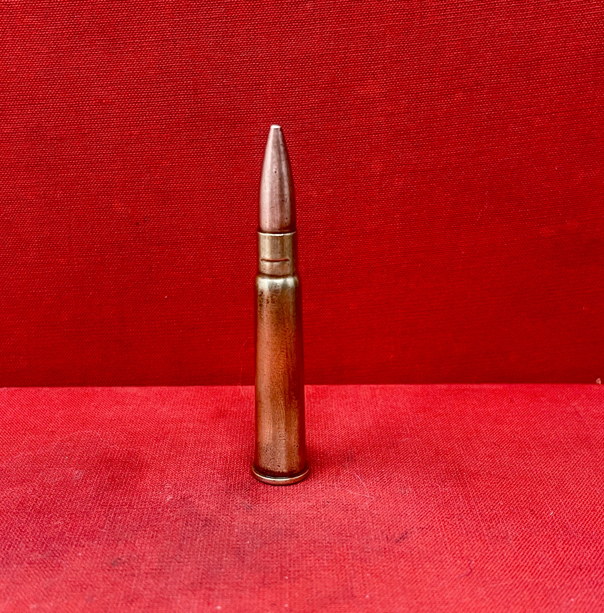 "Explore the INERT .303 Lee Enfield round, dated 1944 and marked CP - Crompton Parkinson, a deactivated collectible from British WWII military history."