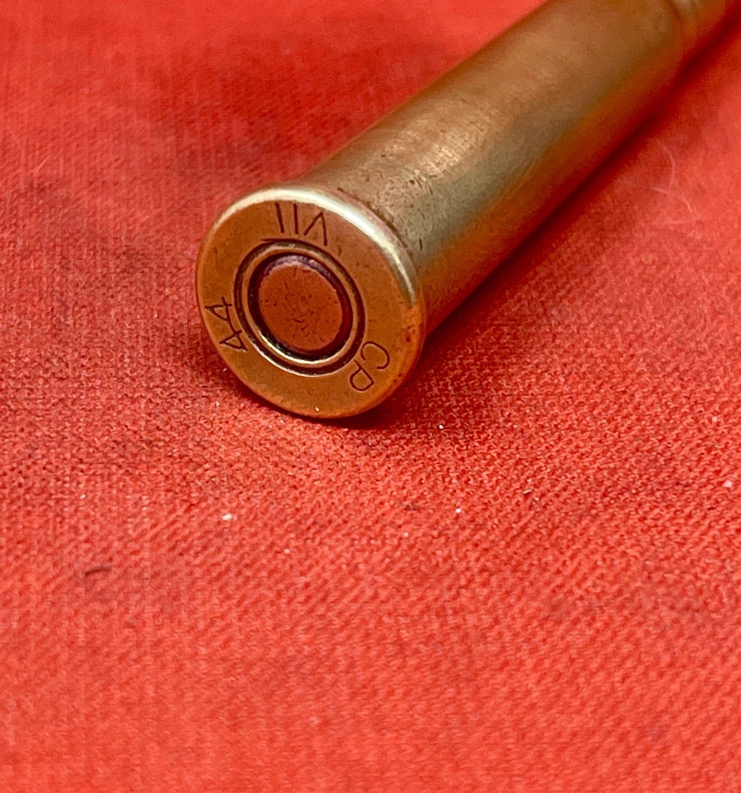 "Explore the INERT .303 Lee Enfield round, dated 1944 and marked CP - Crompton Parkinson, a deactivated collectible from British WWII military history."