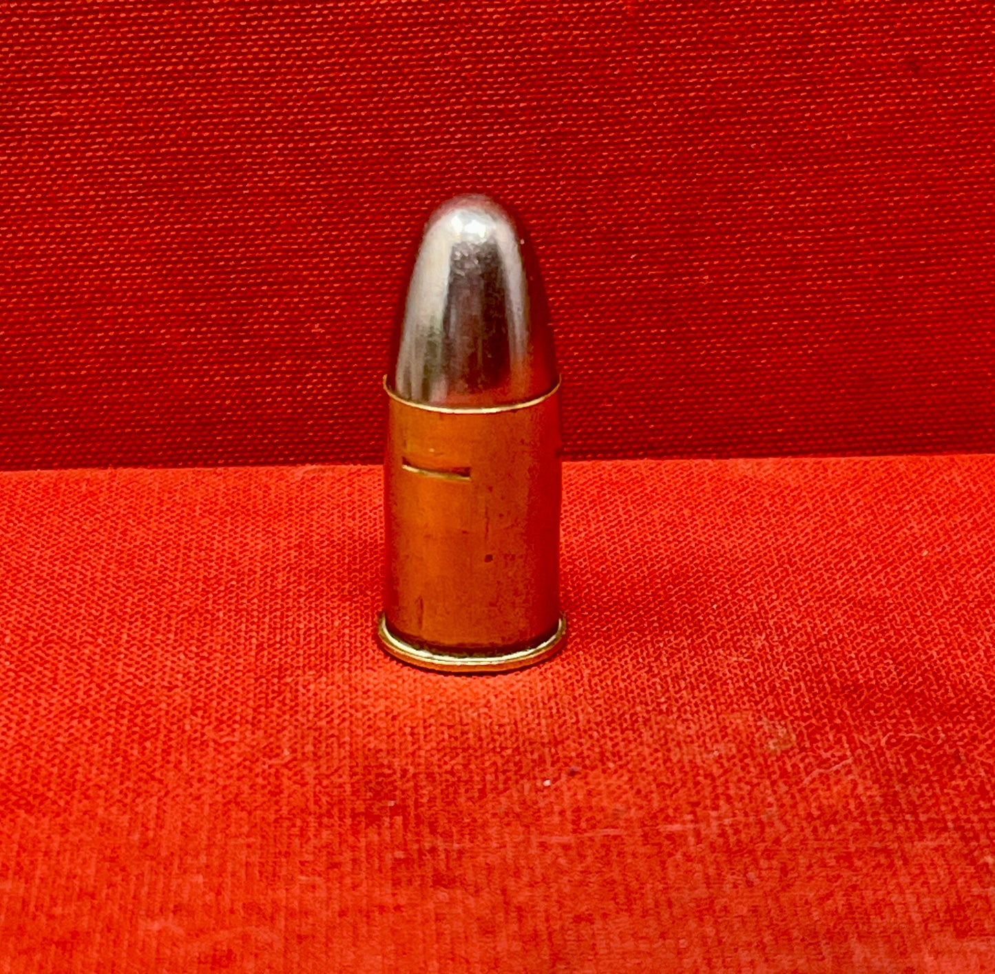 Collectible .455 INERT British 1941 K round by Kynoch. WWII-era deactivated ammunition, perfect for display and collectors of military history.