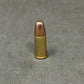 Original INERT British .380 Webley Round — 1953 RG Radway Green Brass Cartridge