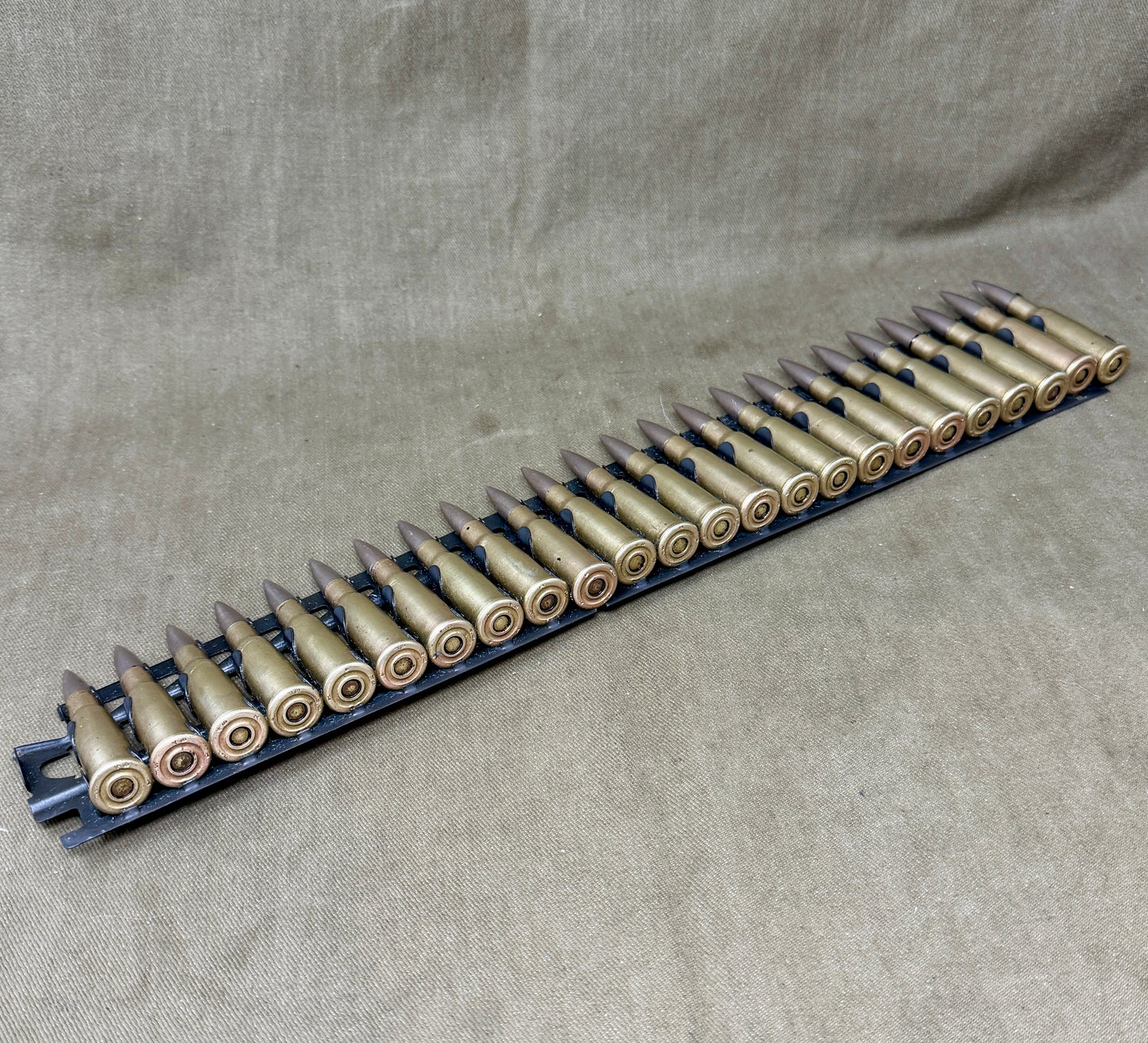 30 × Inert French 8×50mmR Lebel 1948 Rounds on Original 30-Round Hotchkiss Strip – Oil Injected Display Set