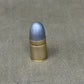 An original .450 calibre Kynoch inert brass cartridge