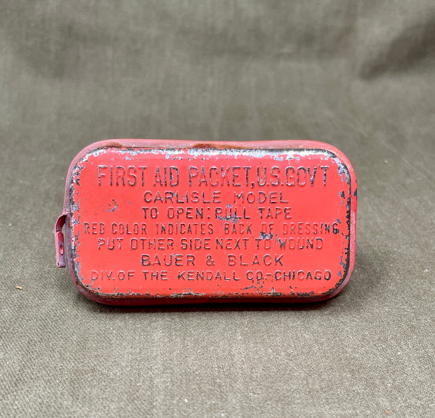 Red US Army Dressing First Aid Packet US Govt Carlisle Model by Bauer & Black Div of The Kendall Co Chicago (Copy)