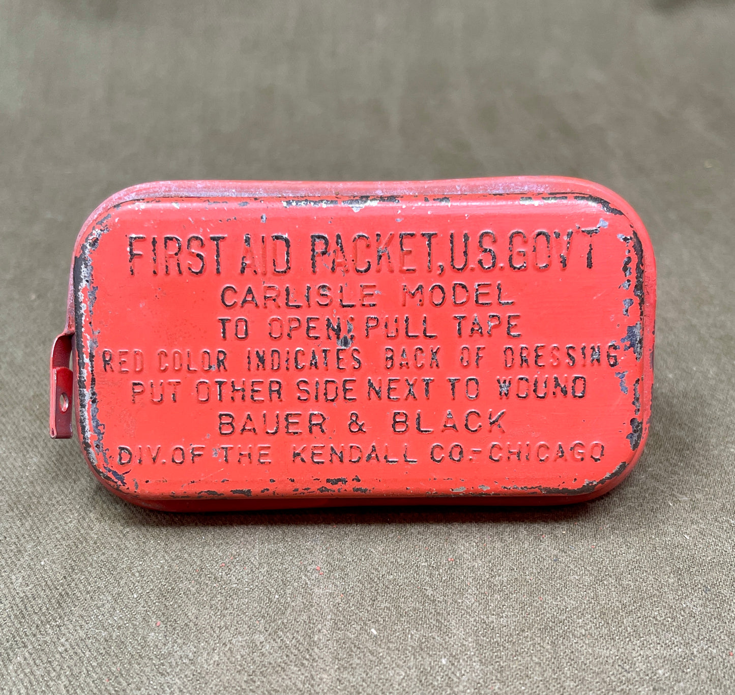 Red US Army Dressing First Aid Packet US Govt Carlisle Model by Bauer & Black Div of The Kendall Co Chicago (Copy)