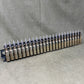 30 × Inert French 8×50mmR Lebel 1948 Rounds on Original 30-Round Hotchkiss Strip – Oil Injected Display Set