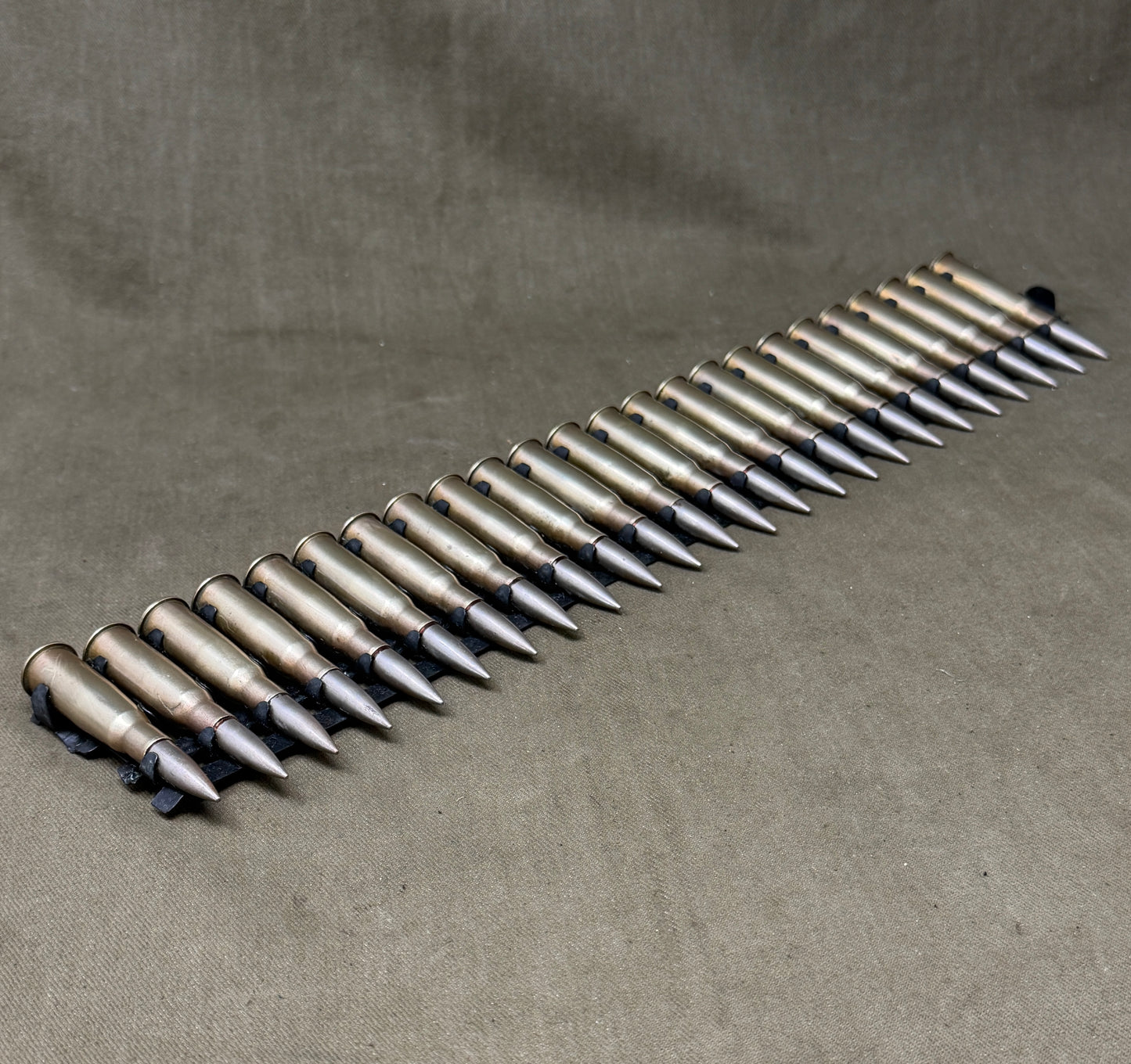30 × Inert French 8×50mmR Lebel 1948 Rounds on Original 30-Round Hotchkiss Strip – Oil Injected Display Set