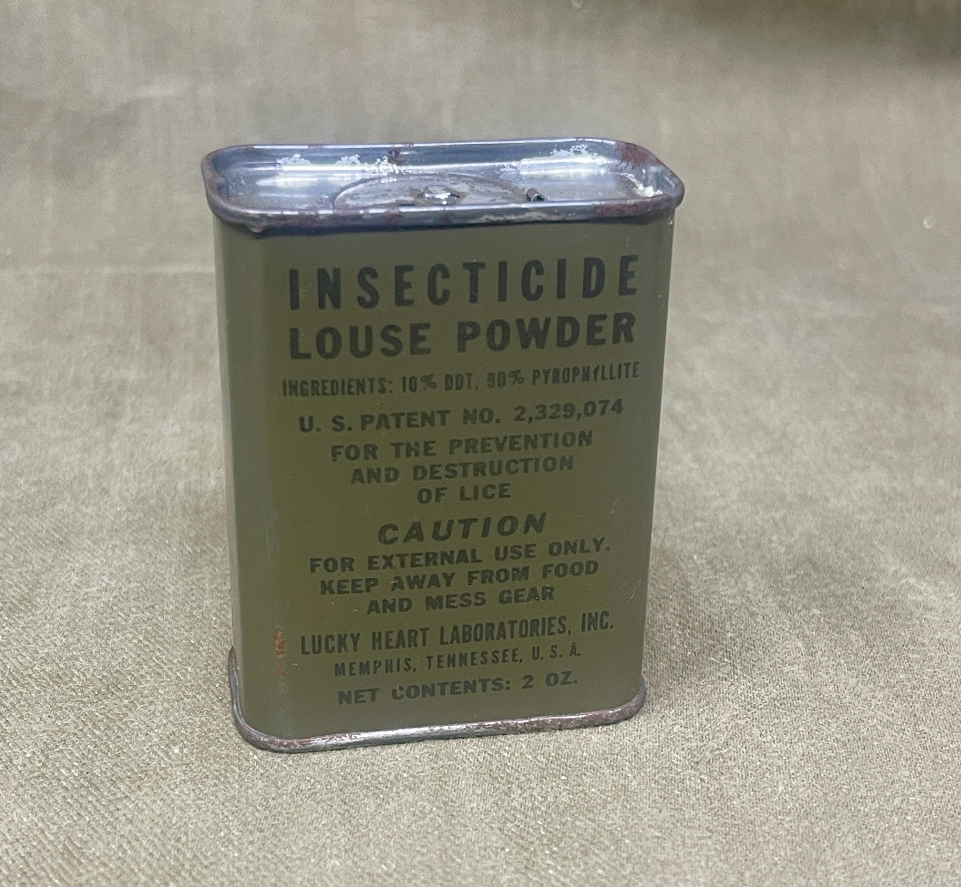 Genuine WWII US insecticide powder tin, manufactured by McCormick & Co., Baltimore, Maryland. Contents: 2 oz. Issued to every GI.

Mint, unopened condition, straight from the carton dated June 1943