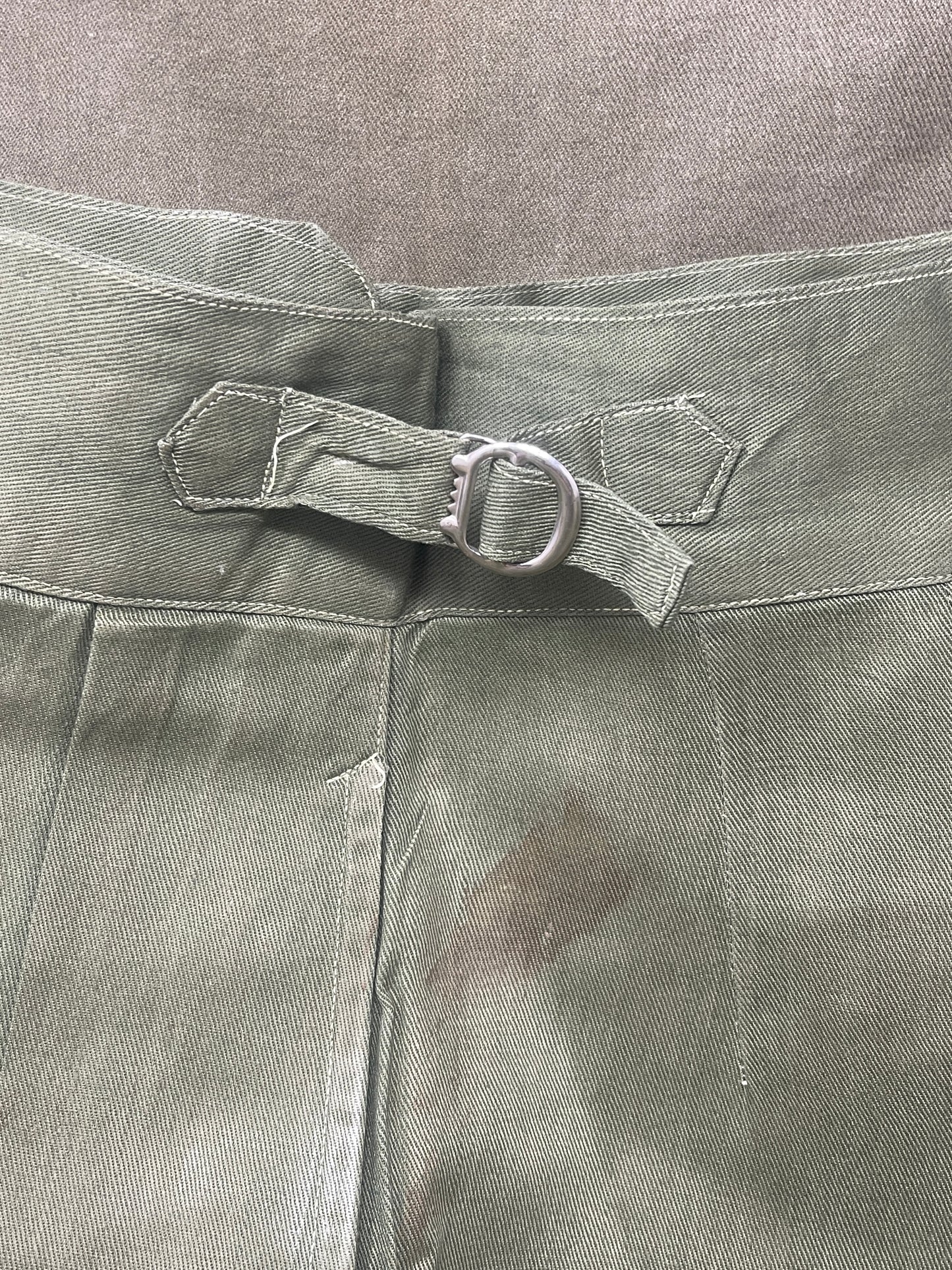 Original 1950s British Army Jungle Green shorts, locally made, Size 3 (30"-31" waist). Excellent condition with classic military design—ideal for collectors or re-enactors.