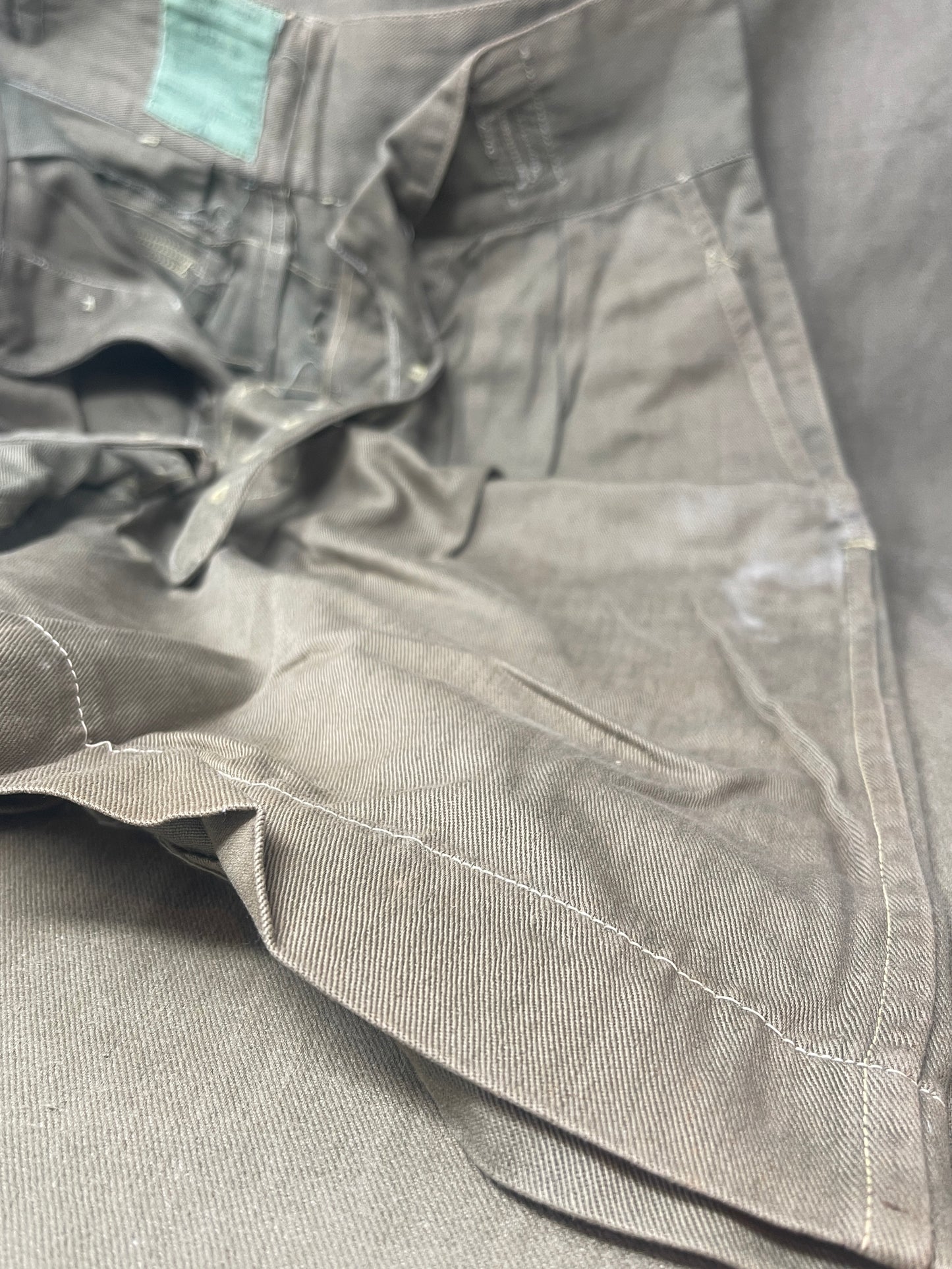 Original 1950s British Army Jungle Green shorts, locally made, Size 3 (30"-31" waist). Excellent condition with classic military design—ideal for collectors or re-enactors.