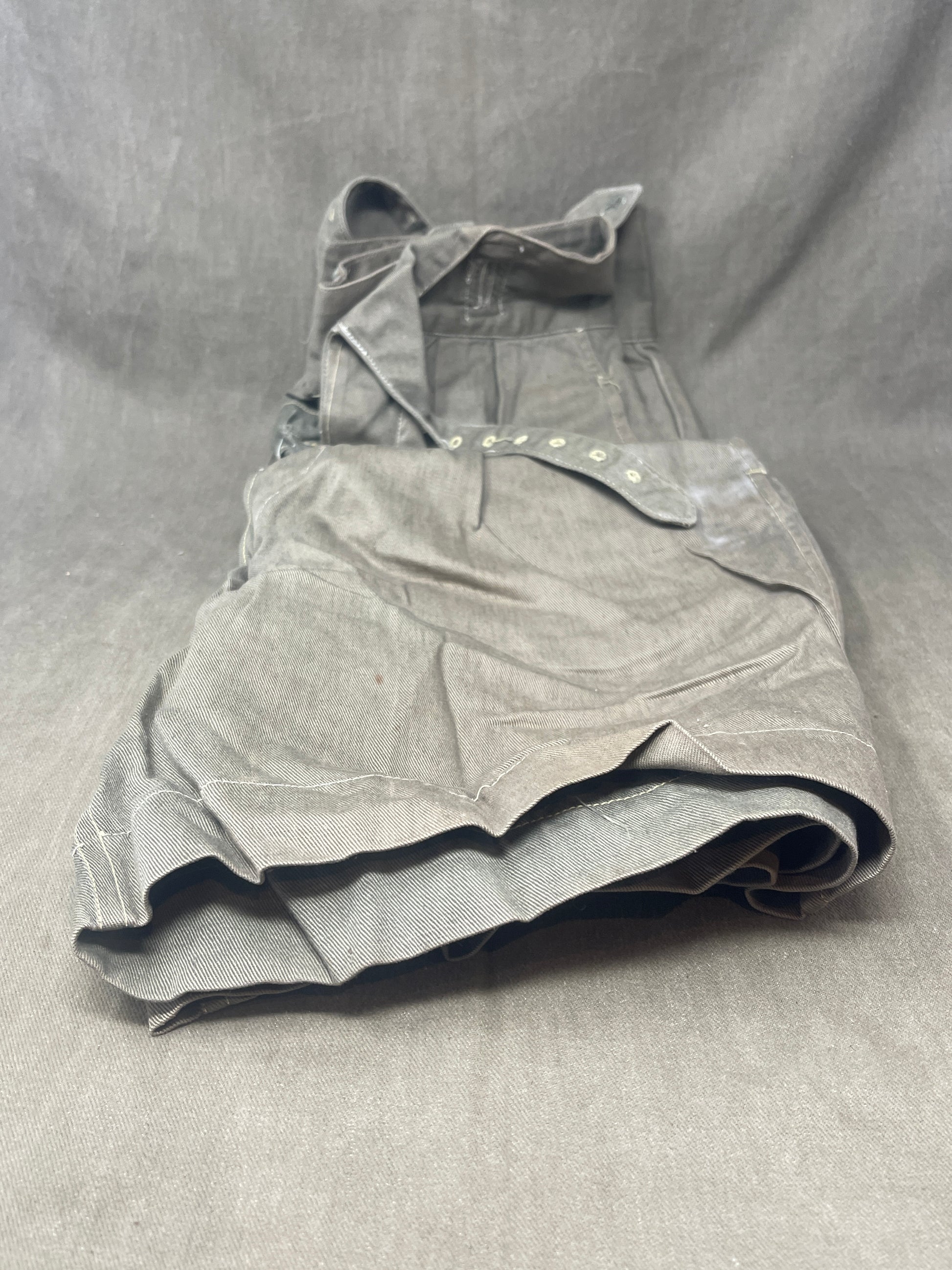 Original 1950s British Army Jungle Green shorts, locally made, Size 3 (30"-31" waist). Excellent condition with classic military design—ideal for collectors or re-enactors.