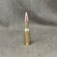 An Inert British .50 Cal Spotter round for 120mm Wombat