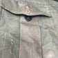 This original 1951-dated British Army Jungle Green Bush Jacket is a superb example of early post-war tropical combat clothing, manufactured by the reputable N. Lotery & Co. Ltd. Made from sturdy, breathable cotton in classic Jungle Green, this jacket was designed for use in humid and challenging environments such as Malaya and other post-war theatres of operation.

The jacket is in excellent condition, showing minimal signs of wear, with its color, stitching, and structural integrity all remarkably well-pre