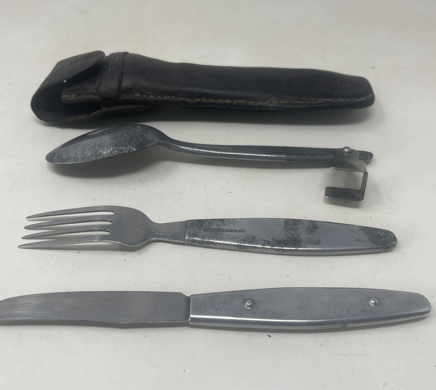 Knife, fork, and spoon set dated 1944