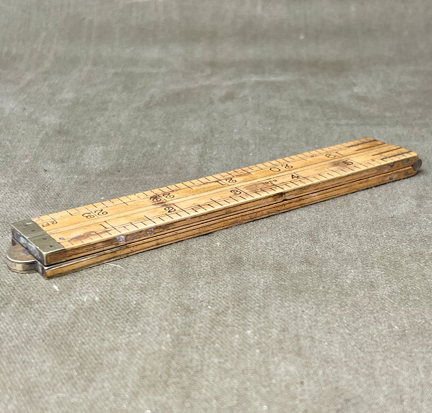 Shop the 1939-dated Rabone No.1375 Boxwood Yard Ruler. A rare, warranted folding ruler made in England—perfect for collectors, woodworkers, and vintage tool lovers.