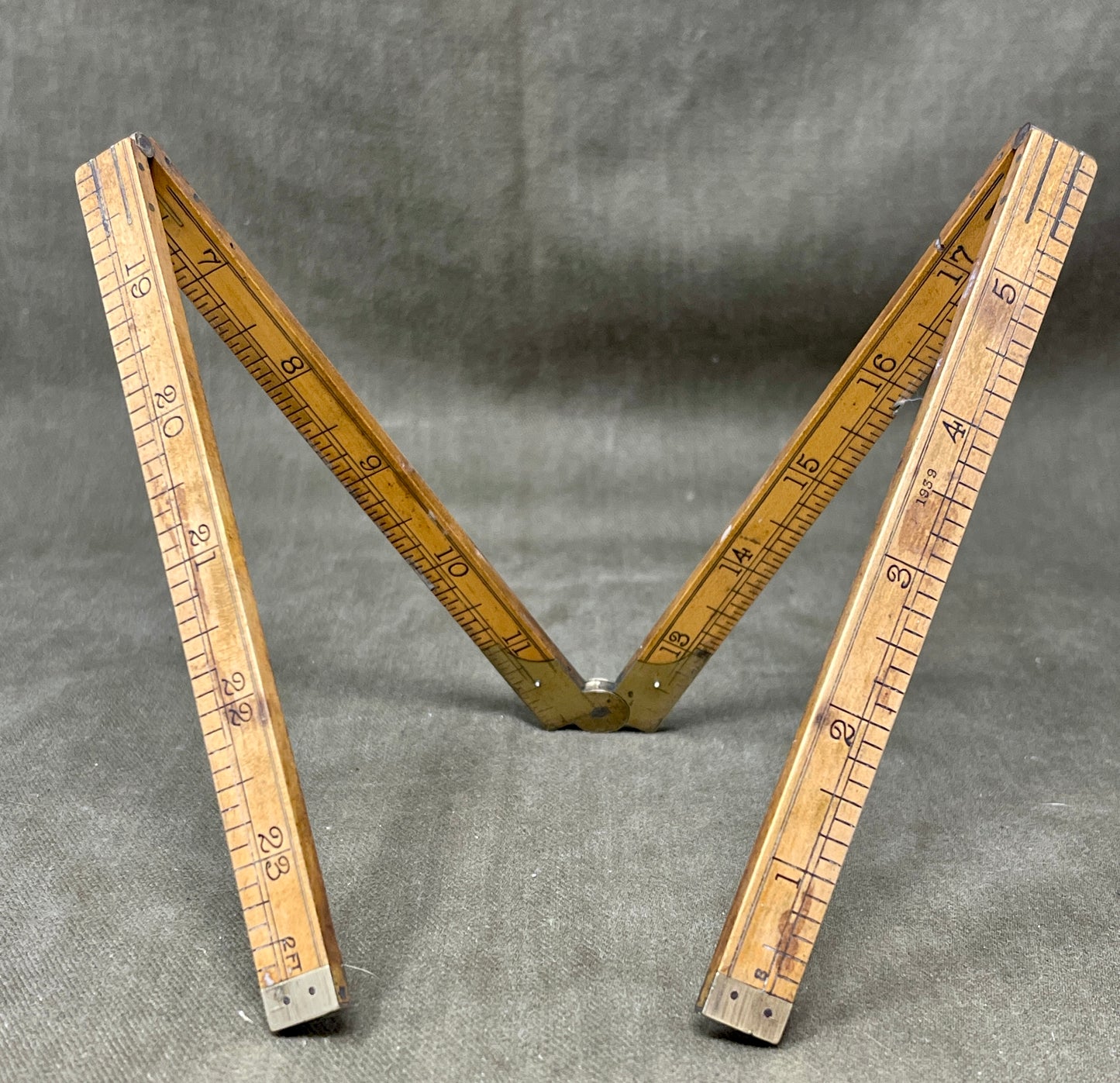 Shop the 1939-dated Rabone No.1375 Boxwood Yard Ruler. A rare, warranted folding ruler made in England—perfect for collectors, woodworkers, and vintage tool lovers.