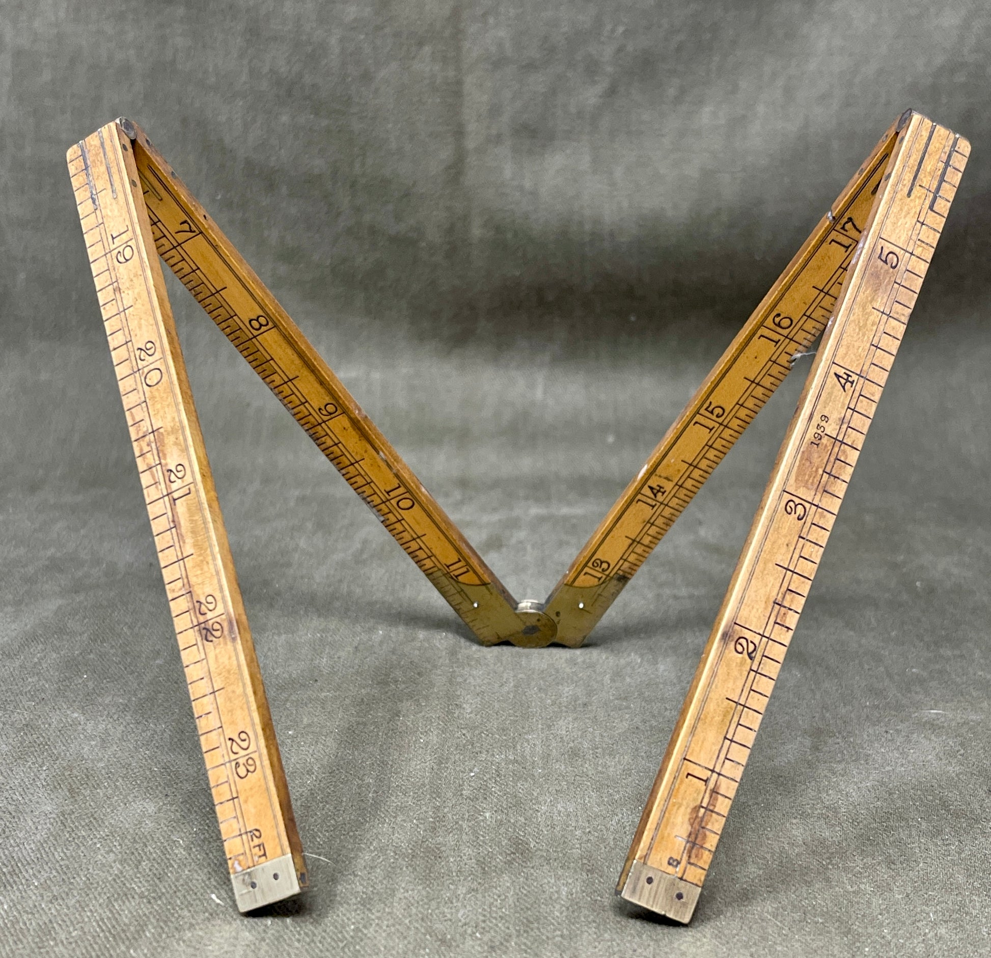 Shop the 1939-dated Rabone No.1375 Boxwood Yard Ruler. A rare, warranted folding ruler made in England—perfect for collectors, woodworkers, and vintage tool lovers.