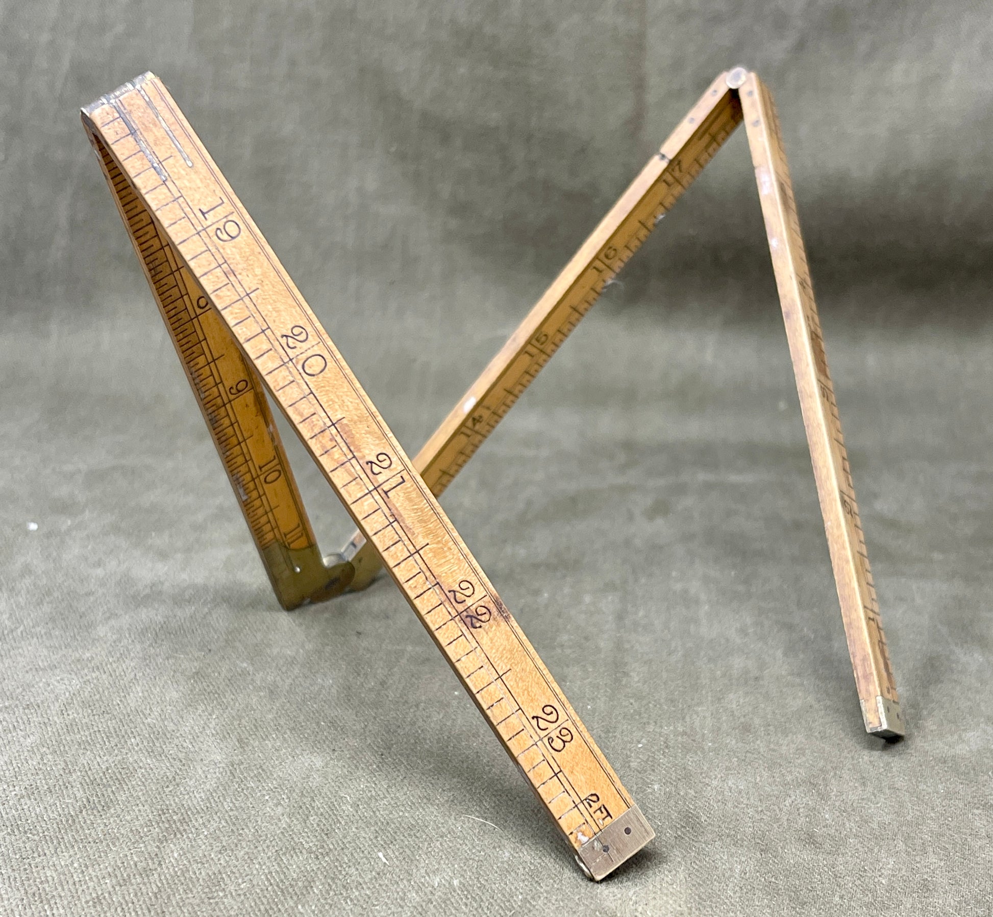 Shop the 1939-dated Rabone No.1375 Boxwood Yard Ruler. A rare, warranted folding ruler made in England—perfect for collectors, woodworkers, and vintage tool lovers.