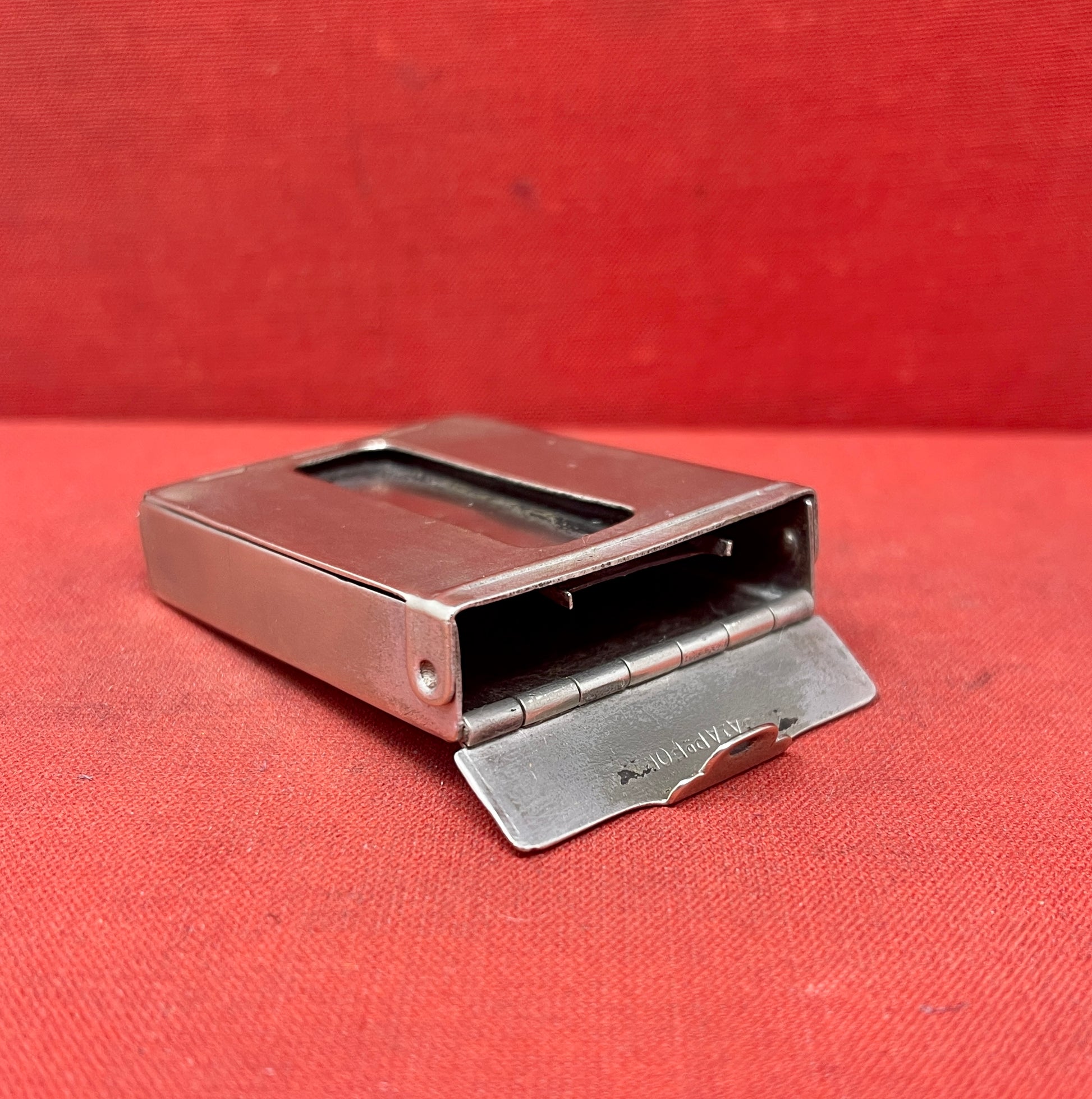 Add a touch of vintage charm to your collection with this original British brass hinged match holder, dating to the 1920s. Crafted from solid brass with a warm aged patina, it features a hinged lid and internal compartment designed to keep matches dry and ready for use. Compact and practical, it would have been a common pocket or travel item in the early 20th century. Ideal for collectors of antique smoking accessories, vintage EDC items, or brassware. A beautiful and functional relic from post-WWI Britain,