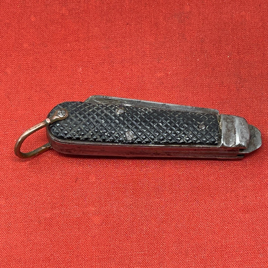 A nice example of a British Jack Knife, dated 1940  The blades are in good condition, the chequered Bakelite grip is intact and all the blades lock and close as they should. The steel can opener is in good condition