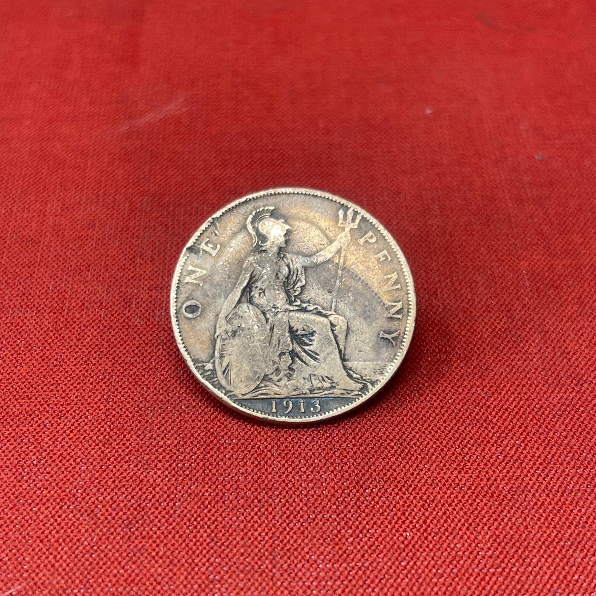 Explore the history and collectability of the King George V One Penny dated 1936. Perfect for numismatists and history enthusiasts seeking an authentic piece of British coinage.