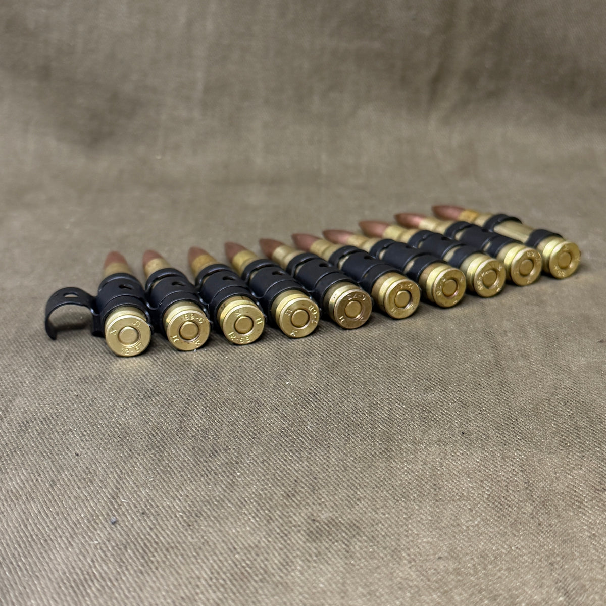 Original vintage Israeli 10 x  7.62×51mm NATO (.308) cartridge belt, manufactured for Israeli military/IDF use.