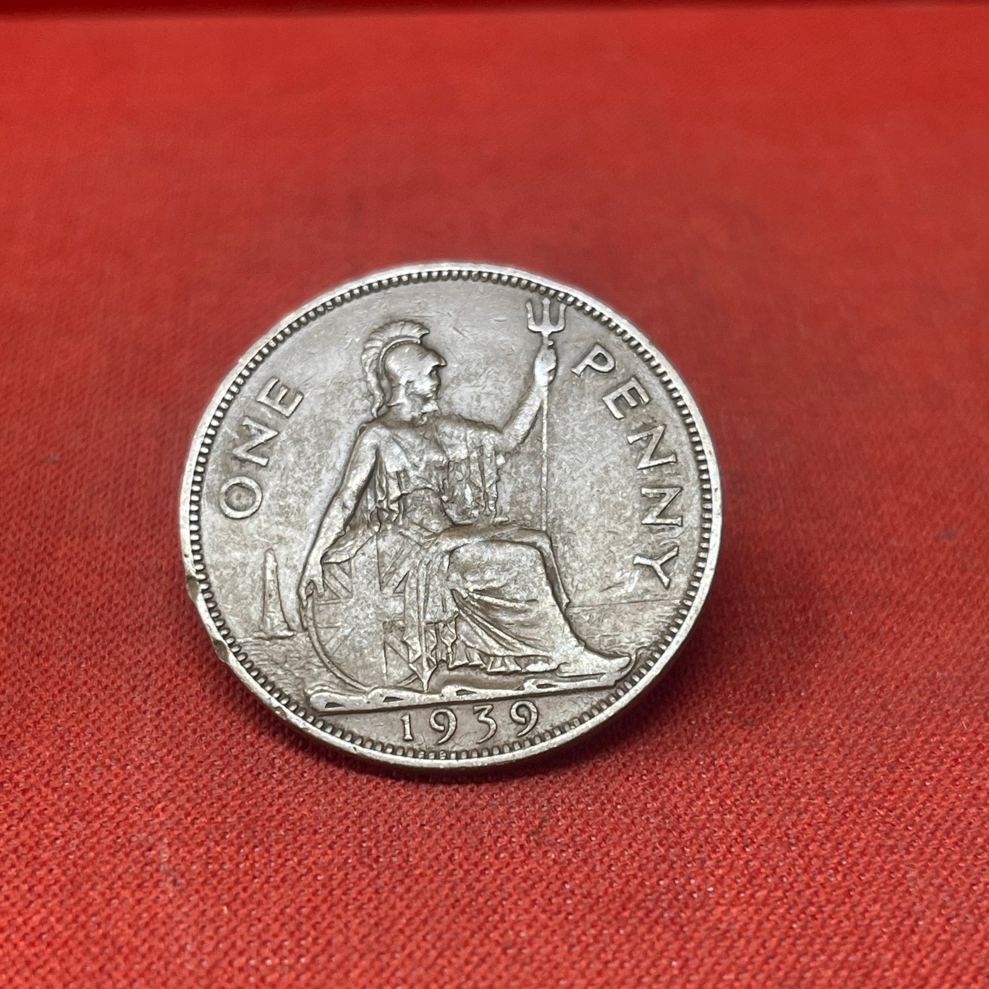 Explore the historical significance of the King George VI One Penny coin, minted from 1937 to 1952. Ideal for collectors and history enthusiasts seeking an authentic piece of British numismatic heritage.