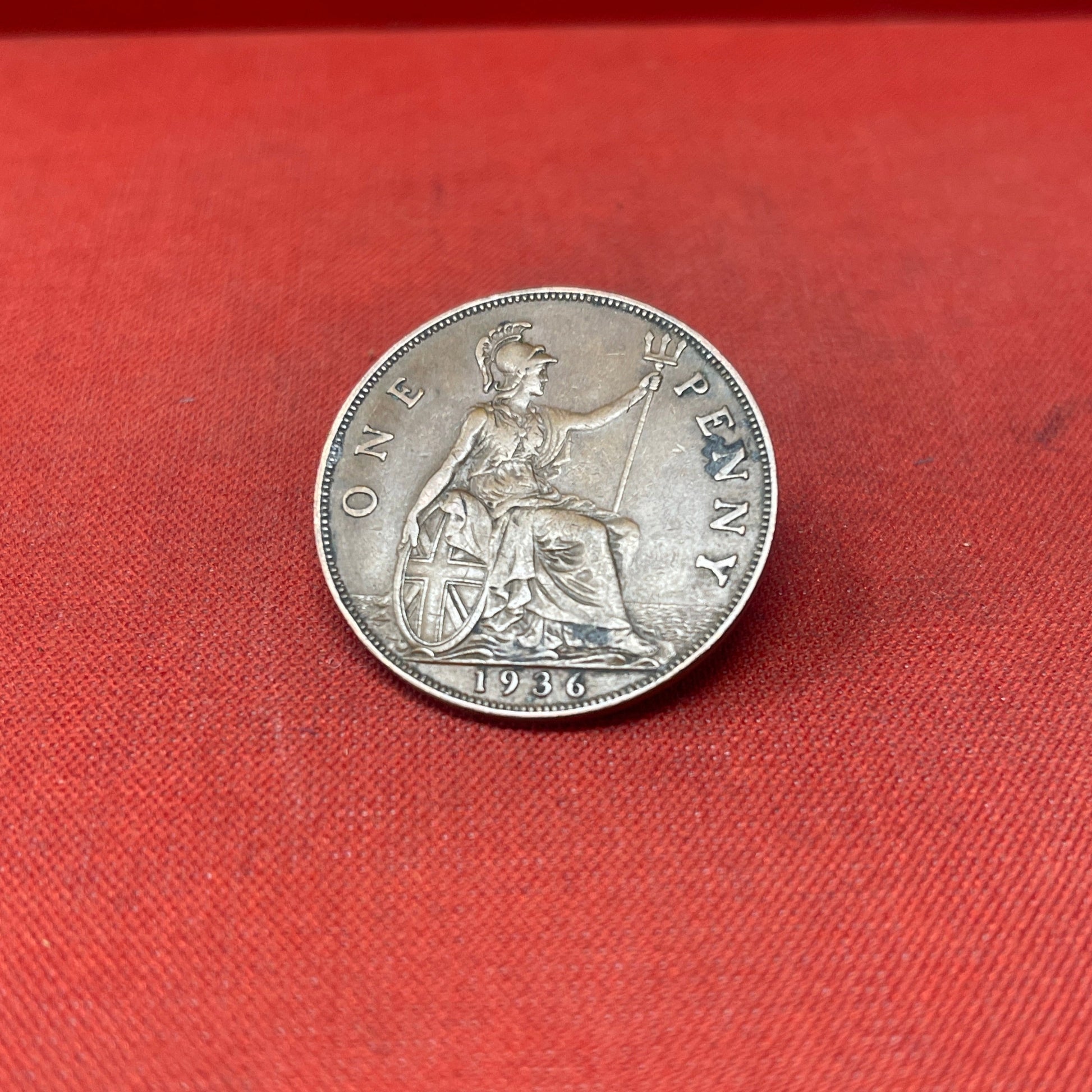 Explore the historical significance of the King George VI One Penny coin, minted from 1937 to 1952. Ideal for collectors and history enthusiasts seeking an authentic piece of British numismatic heritage.