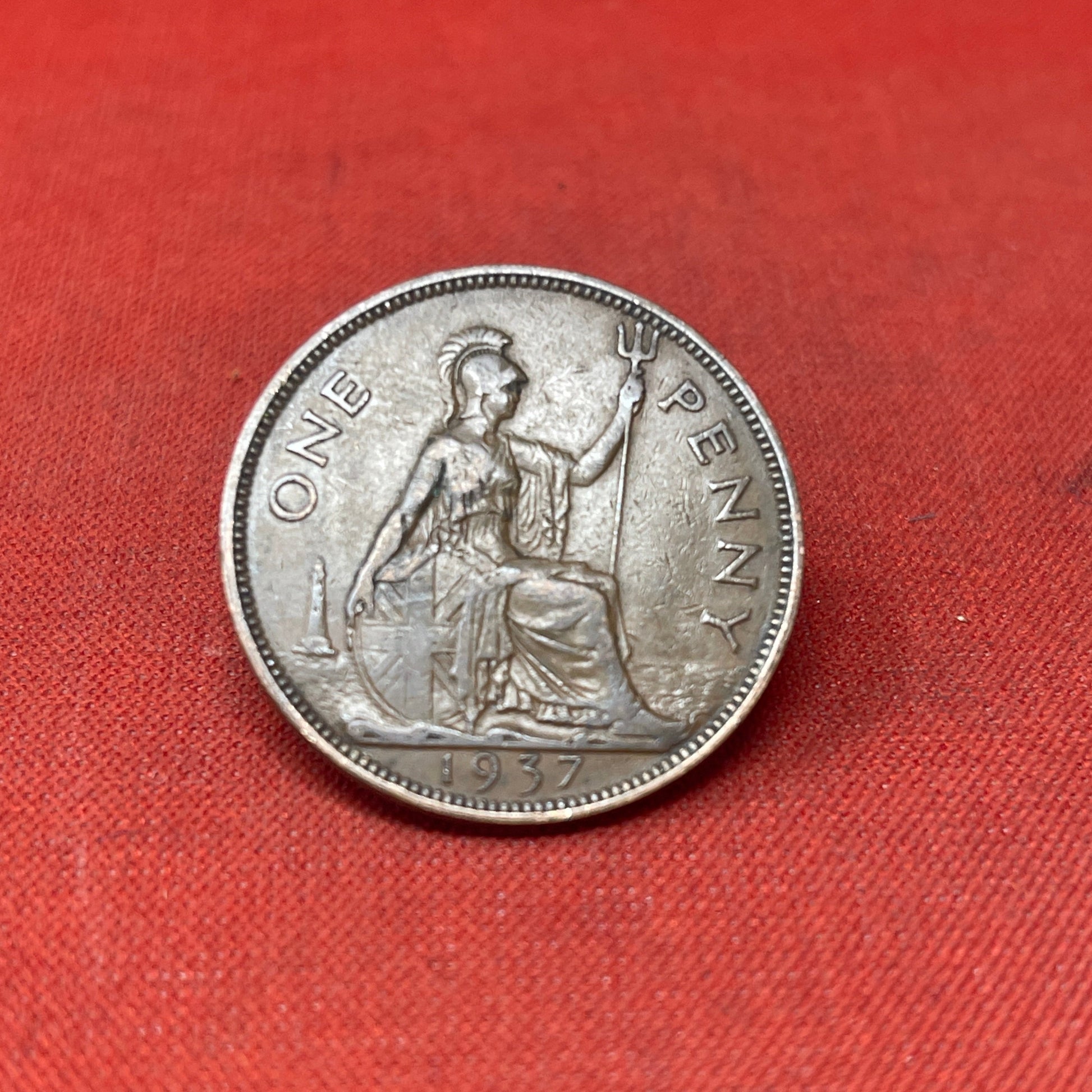 Explore the historical significance of the King George VI One Penny coin, minted from 1937 to 1952. Ideal for collectors and history enthusiasts seeking an authentic piece of British numismatic heritage