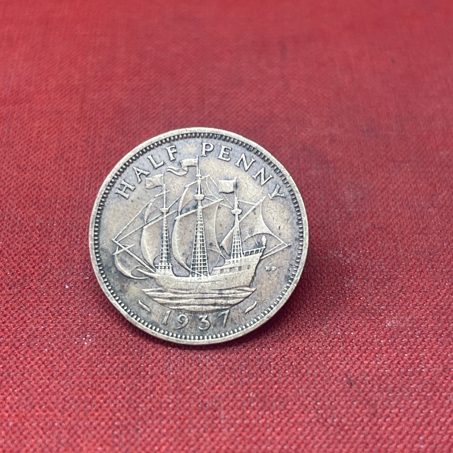 Explore the historical significance of the King George VI 1937 Half Penny. This iconic coin features the Golden Hind and the portrait of George VI, perfect for collectors and history enthusiasts