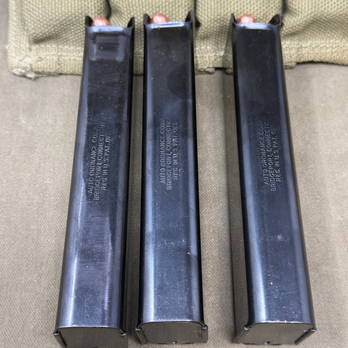 Original WW2 US Thompson SMG Magazine Set – 5 × Auto-Ordnance 20-Round Magazines, US Pouch & 100 x Inert .45 ACP Rounds fitted with INERT primers.