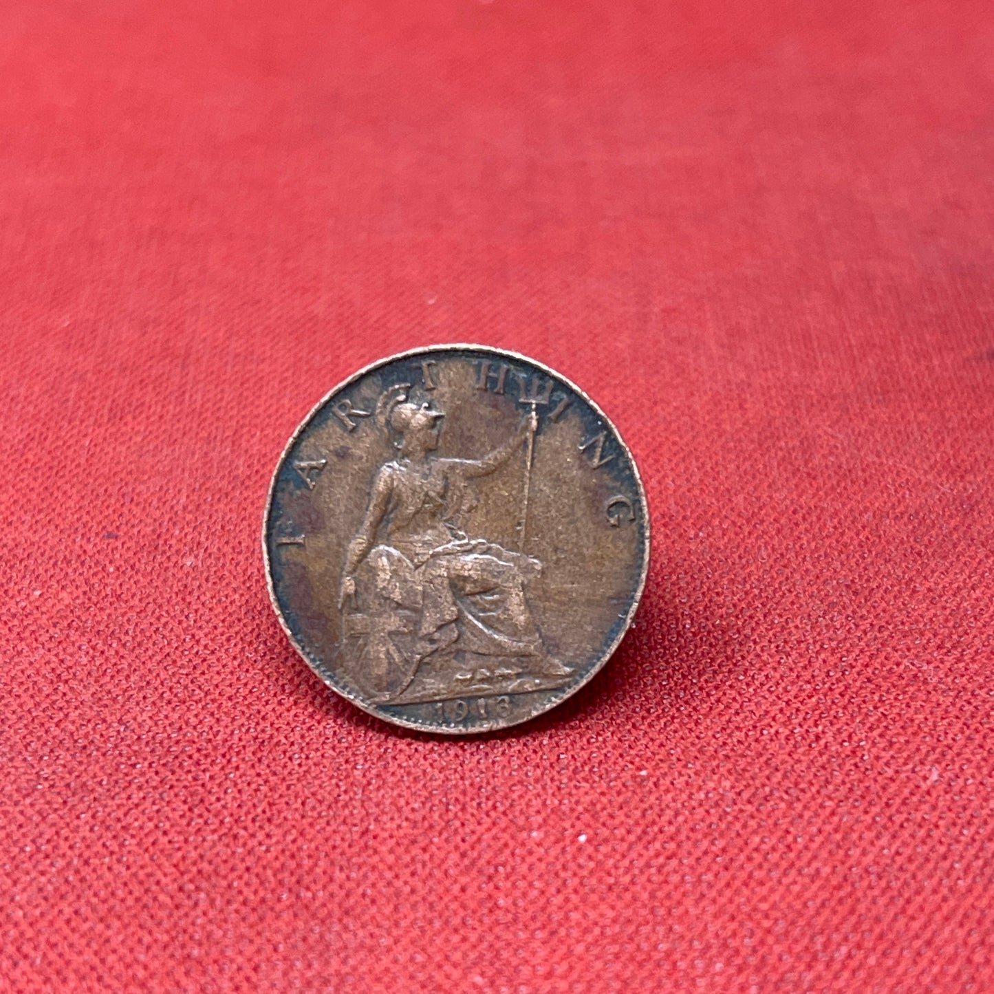 Discover the King George V Farthing, minted from 1911 to 1936. Featuring the iconic Britannia design and King George V's portrait, these historic bronze coins are perfect for collectors and history enthusiasts.