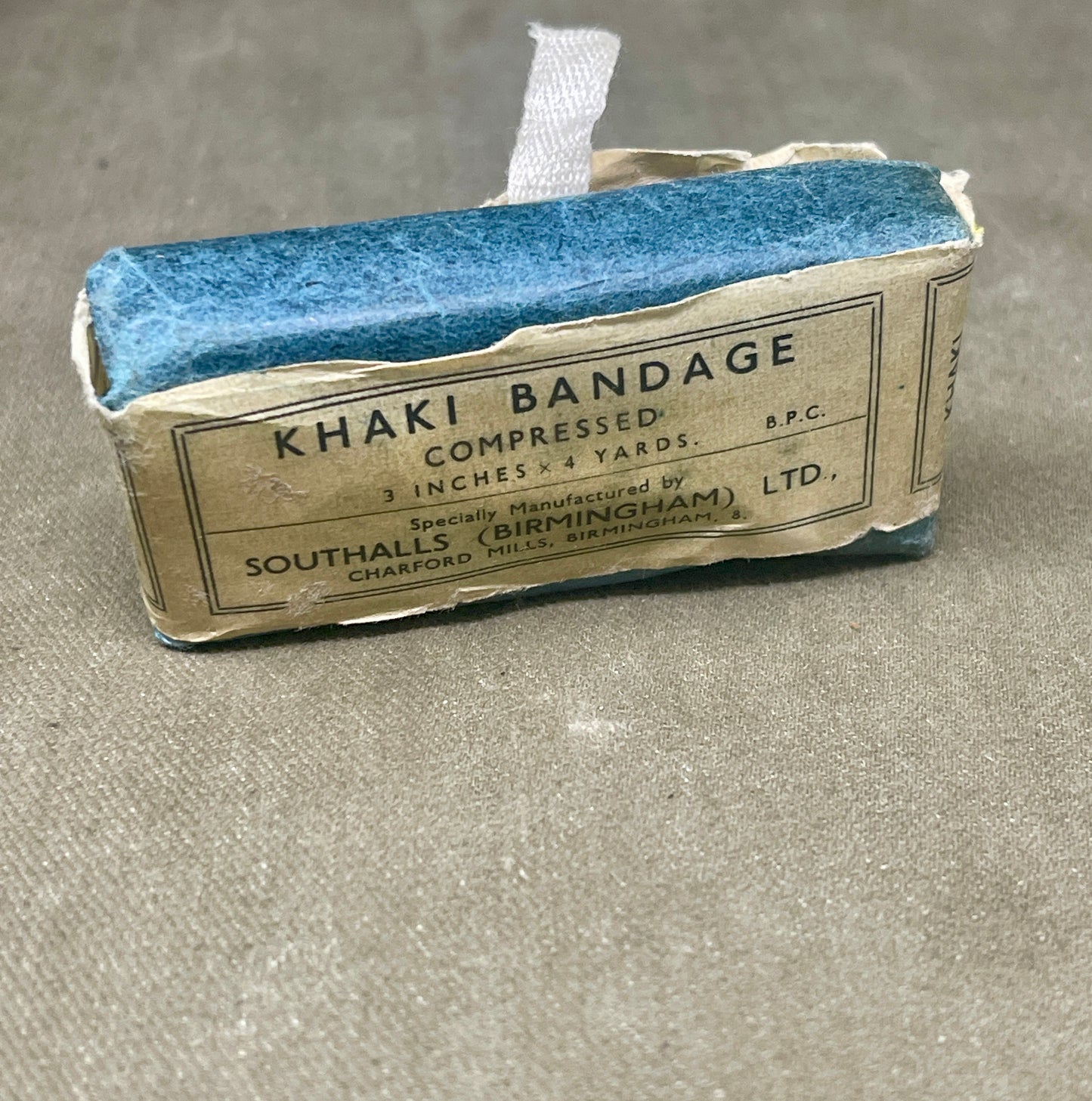Selection of WW2 PeriodKhaki Open Wove Bandage Compressed Dressings