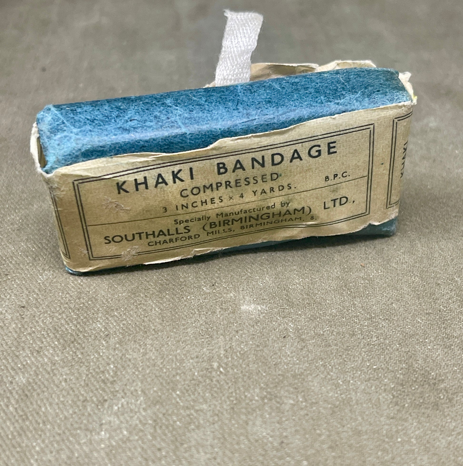Selection of WW2 PeriodKhaki Open Wove Bandage Compressed Dressings