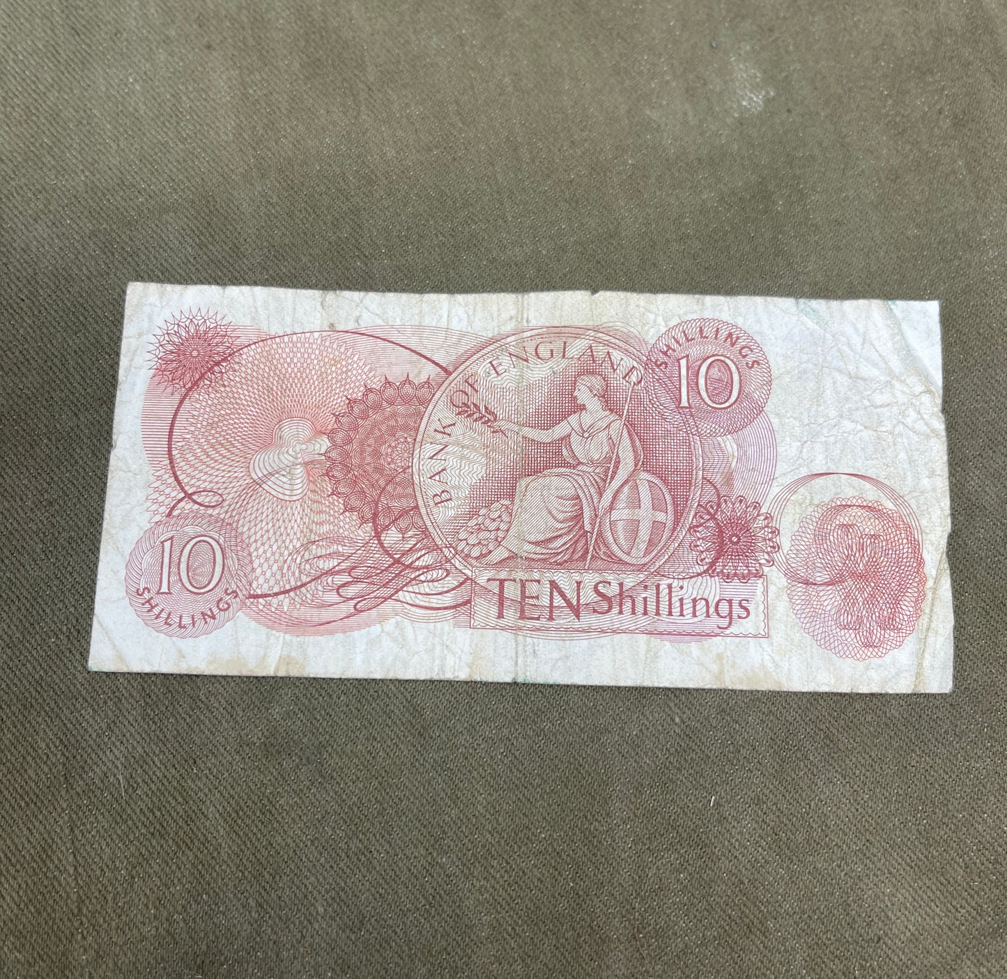 This selection features original Bank of England 10 Shilling notes signed by J.S. Fforde, catalogued as Dugg B309 in the English banknote series. Issued between 1967 and 1970, these notes are iconic pieces of British pre-decimal currency, bearing the classic Britannia design and red-brown colouring. Each note in this lot is in circulated (used) condition, showing varying degrees of wear, creasing, and edge softening typical of handling and circulation. Despite this, the notes remain clear and legible, with 
