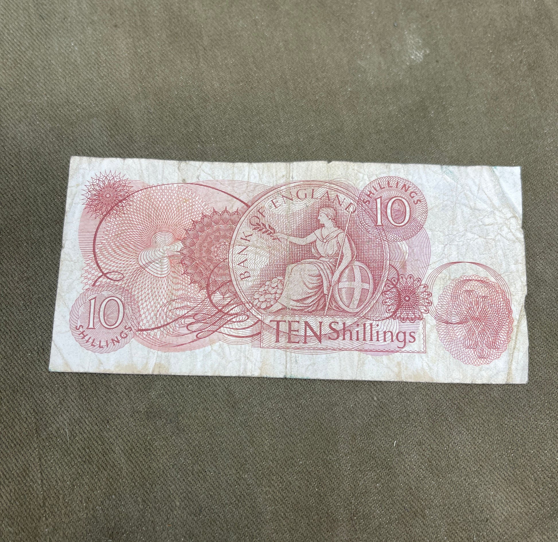 This selection features original Bank of England 10 Shilling notes signed by J.S. Fforde, catalogued as Dugg B309 in the English banknote series. Issued between 1967 and 1970, these notes are iconic pieces of British pre-decimal currency, bearing the classic Britannia design and red-brown colouring. Each note in this lot is in circulated (used) condition, showing varying degrees of wear, creasing, and edge softening typical of handling and circulation. Despite this, the notes remain clear and legible, with 