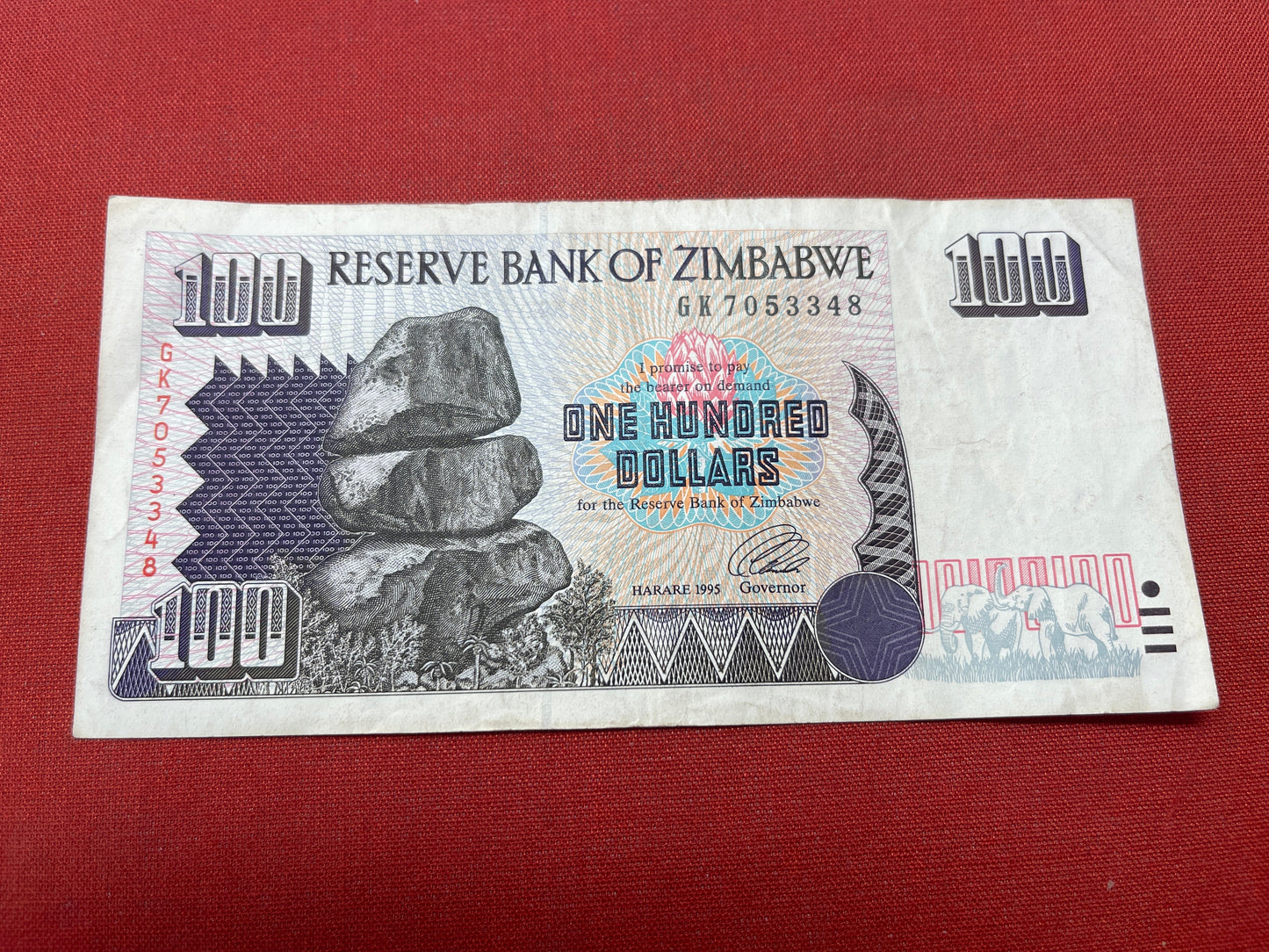 Zimbabwe 100 Dollars Banknote, serial 6K053348