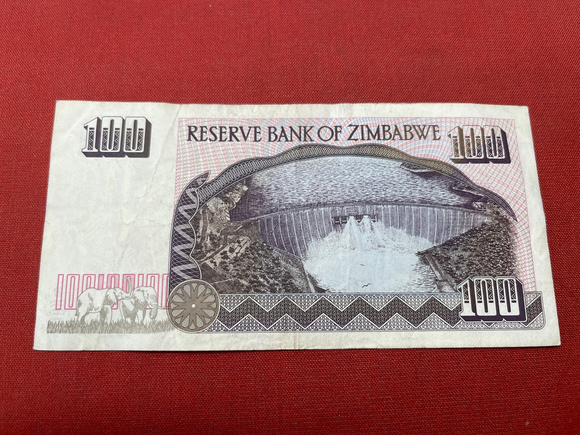 Zimbabwe 100 Dollars Banknote, serial 6K053348