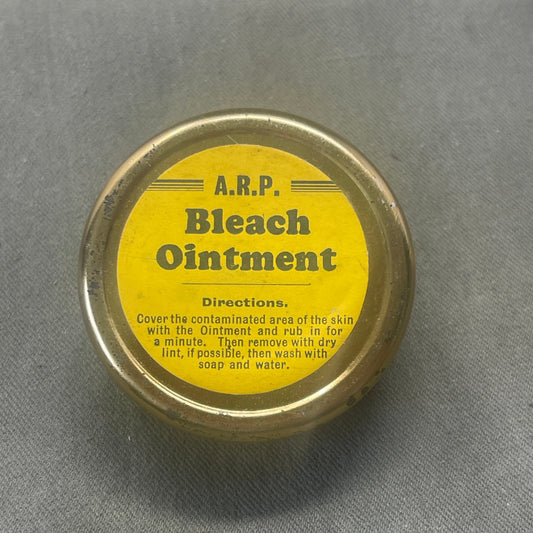 Explore the WW2 1930s British Home Front ARP Bleach Ointment, a rare artifact showcasing civilian preparedness during World War II. Delve into its historical context and preserved contents, offering insight into wartime medical supplies and the resilience of British civilians on the home front.
