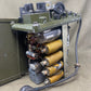 Electrical component with wires and connectors on a beige background