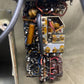 Close-up of electronic components on a metal surface