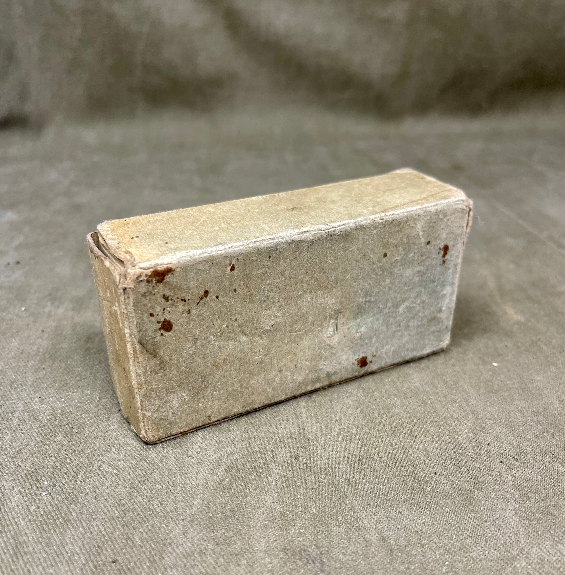 Rectangular concrete block on a gray background