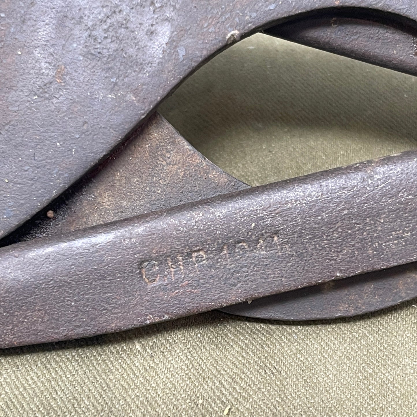 Original WWII British Wire Cutters, dated 1941 and manufactured by C.H.P., are durable steel tools designed for cutting barbed wire and battlefield obstacles. Featuring a spring-loaded mechanism and ergonomic handles, they were essential for British soldiers. Valued by collectors, these cutters represent wartime ingenuity and quality