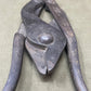 Original WWI British Wire Cutters, dated 1917 and made by Chillington, are durable steel tools with wooden handles, designed for cutting barbed wire in trench warfare. Essential for soldiers, these cutters reflect practical WWI engineering and are highly valued by collectors for their historical significance