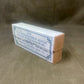 Box of U.S. Springfield Rifle Cartridges on a brown background