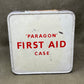 Vintage 'Paragon' first aid case with red text on a gray background