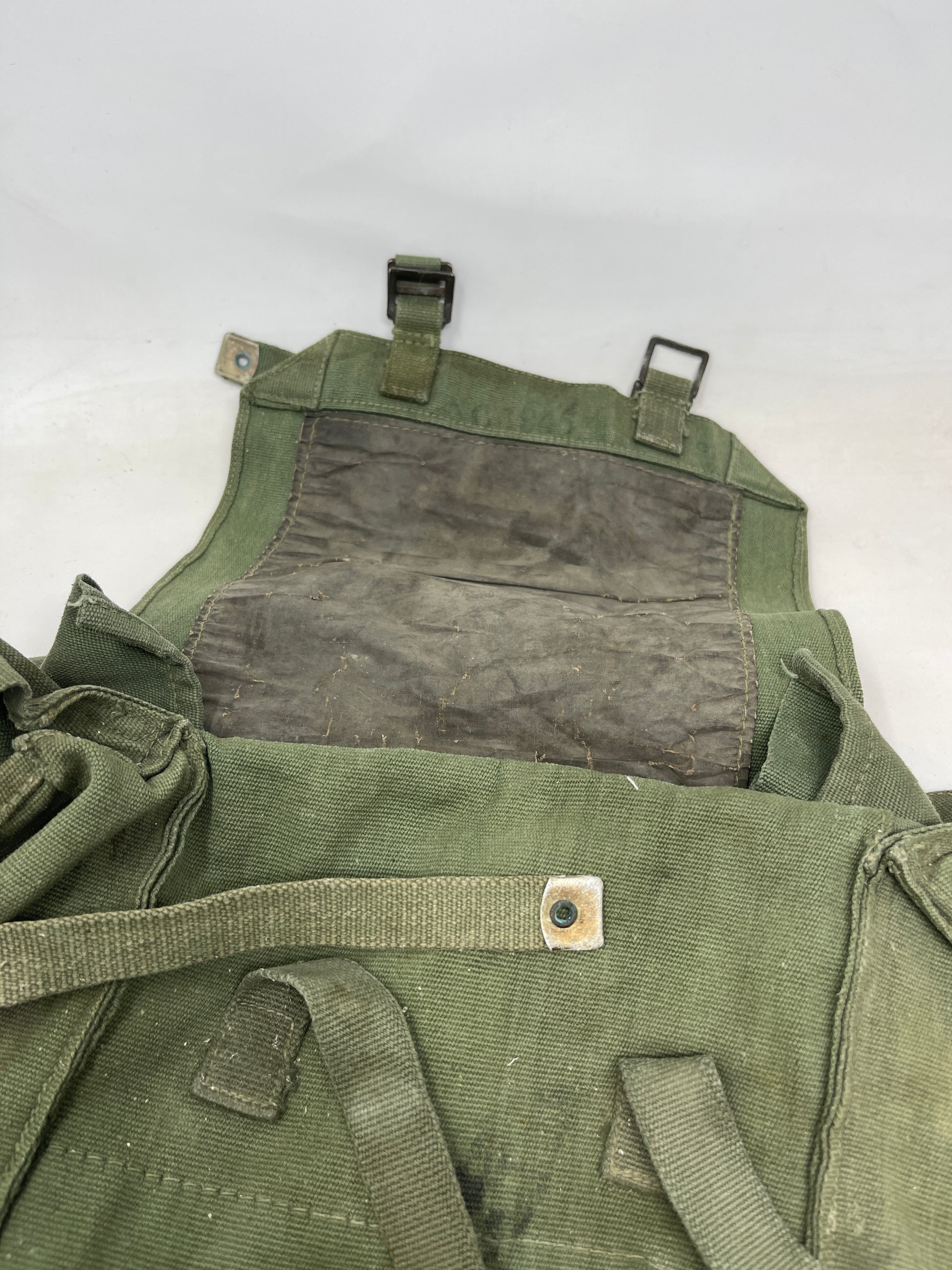 inside image of 1944 Pattern Webbing Small Pack, Jungle showing waterproof cover
