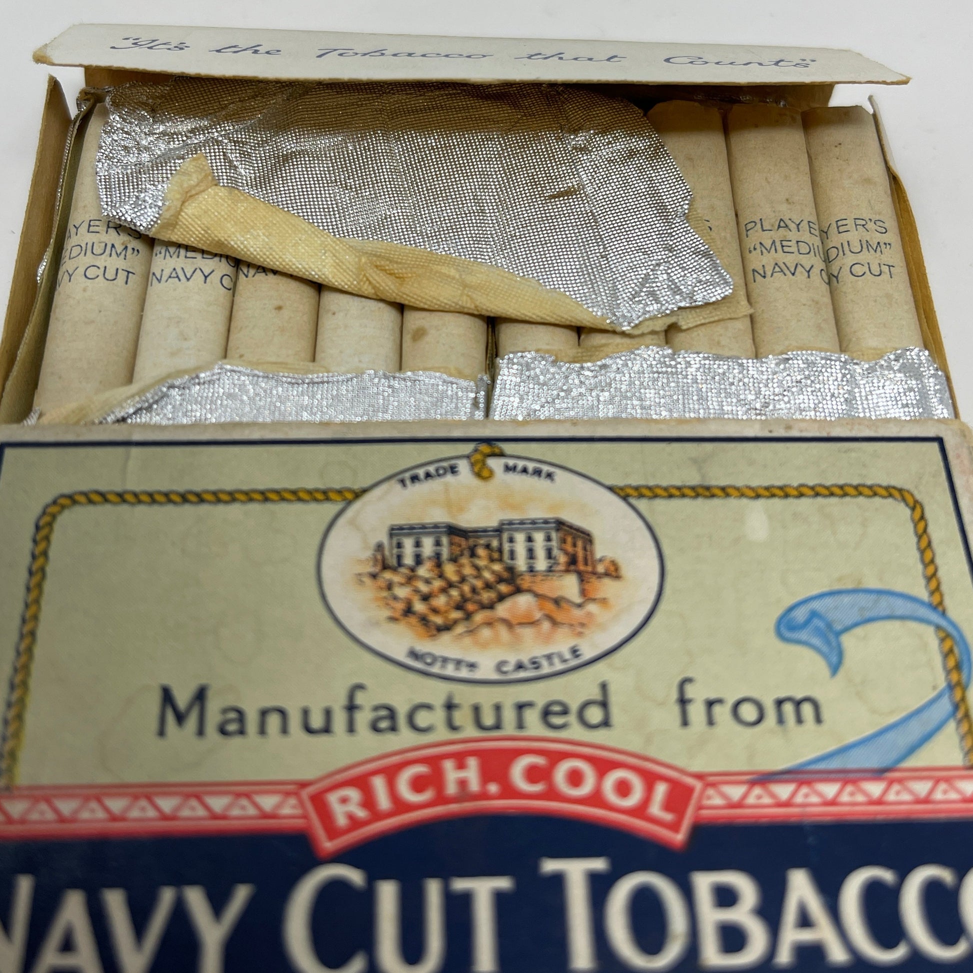 A Packet of Navy Cut Cigarettes showing cigarettes inside box