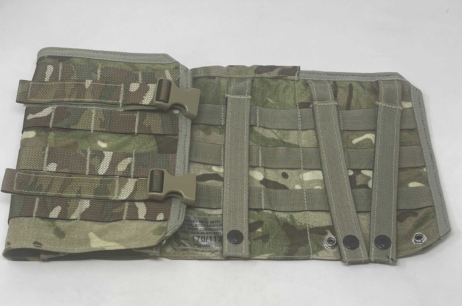 The British Army Osprey Mk1V Cover Body Armour Cummerband Left is a component of the Osprey body armor system used by the British Armed Forces. The cummerband is designed to be attached to the side of the Osprey body armor vest and is used to provide additional support and comfort.