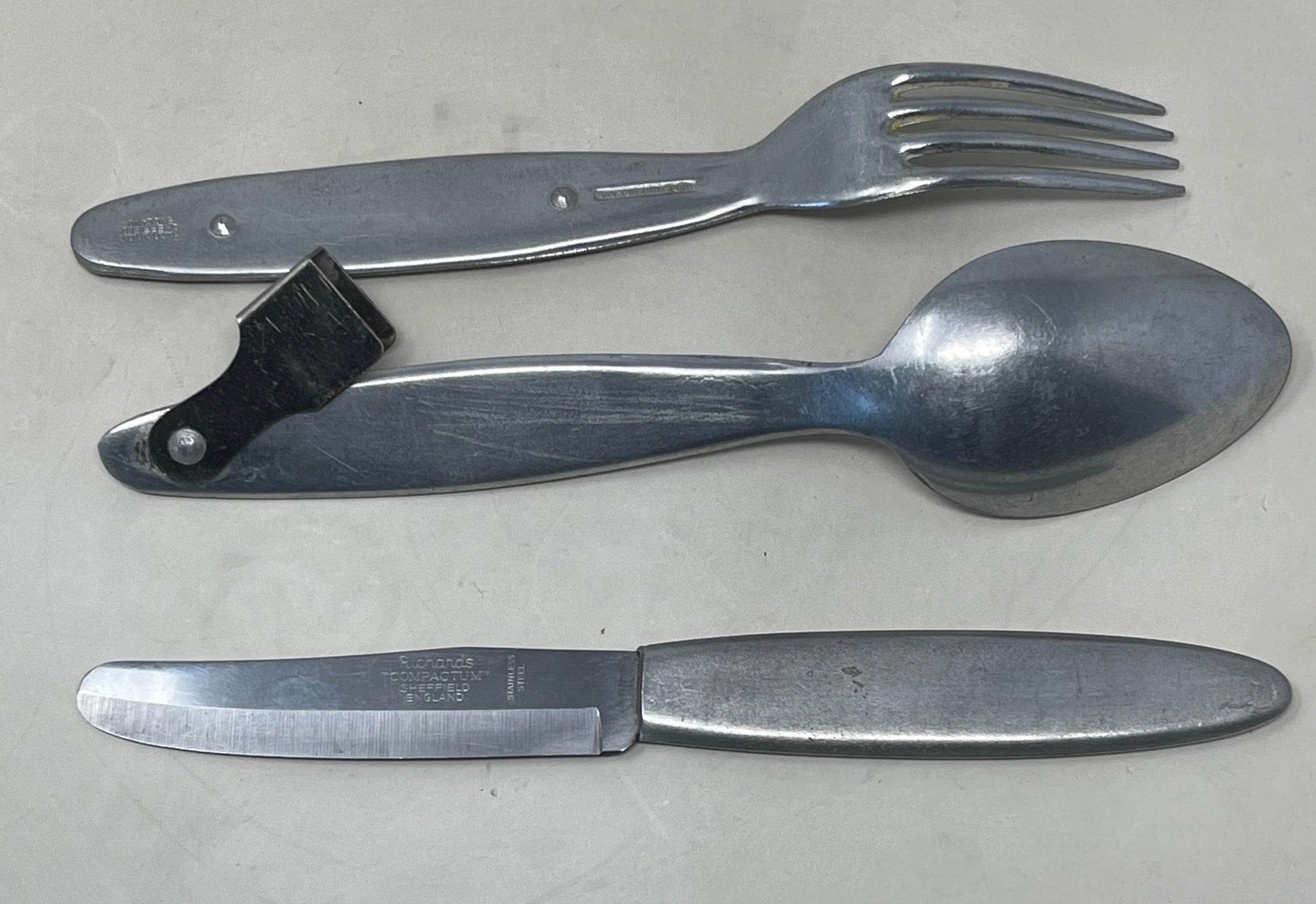 Knife, fork, and spoon set dated 1944